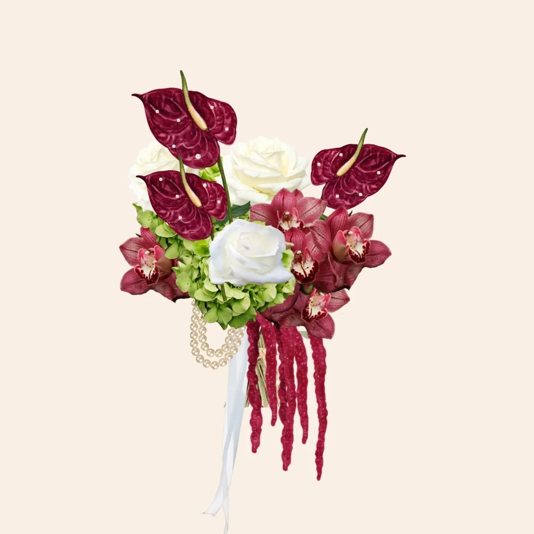 Bouquet of red anthuriums, white roses, purple orchids, green hydrangeas, decorated with pearl beads and red hanging beads
