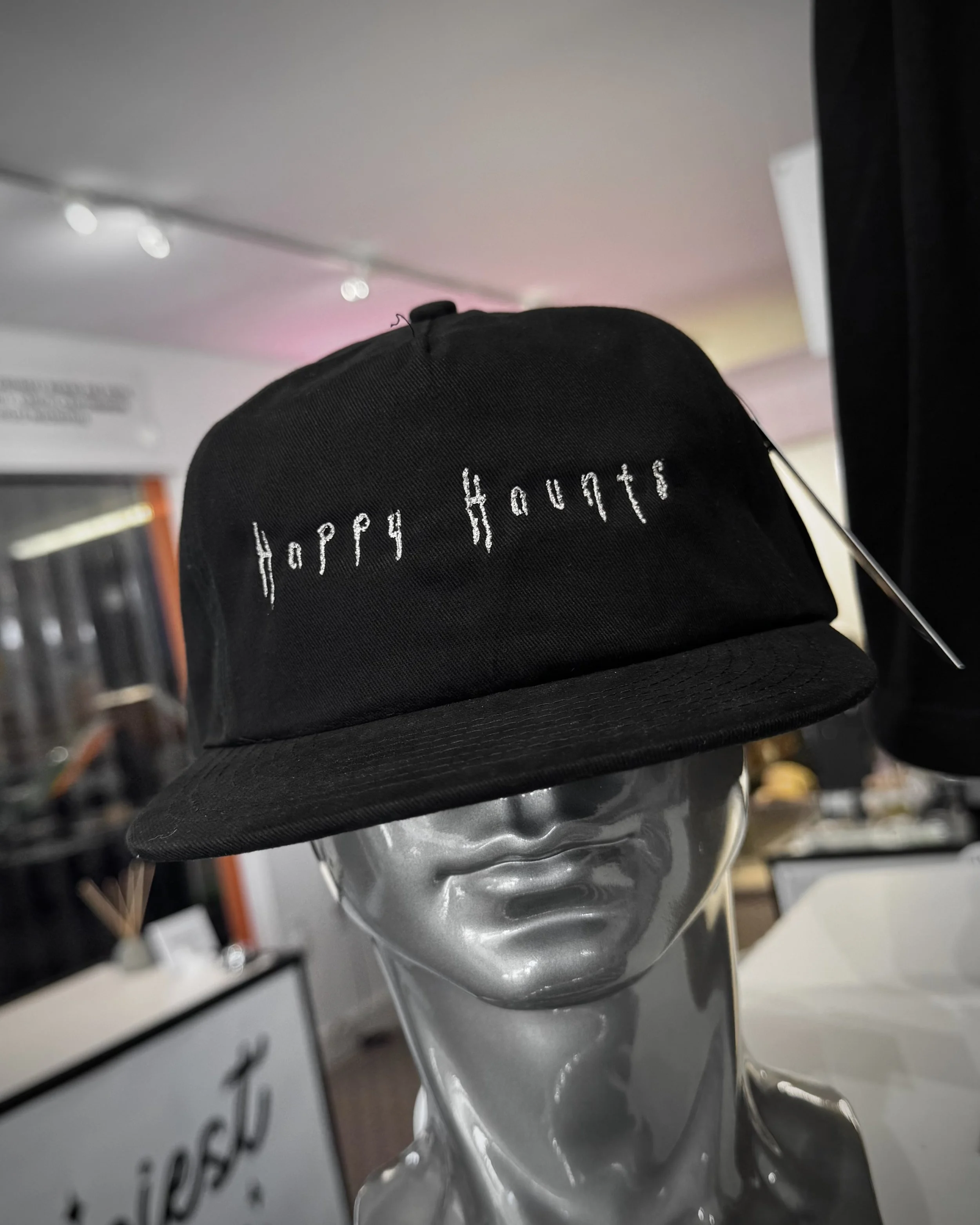 happy haunts hat 3 park hop tees.jpg