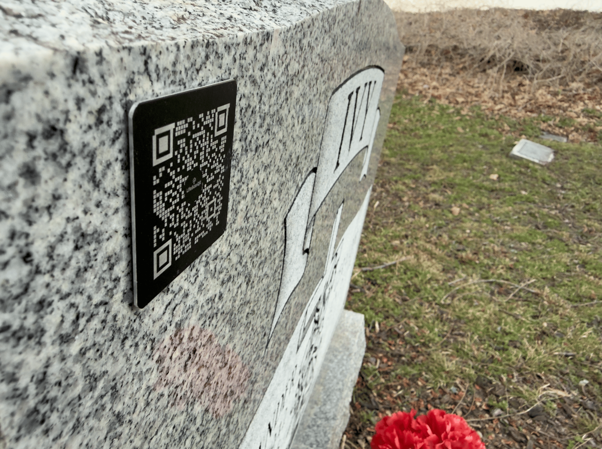 Laser engraved memorial tag on West Memphis tombstone