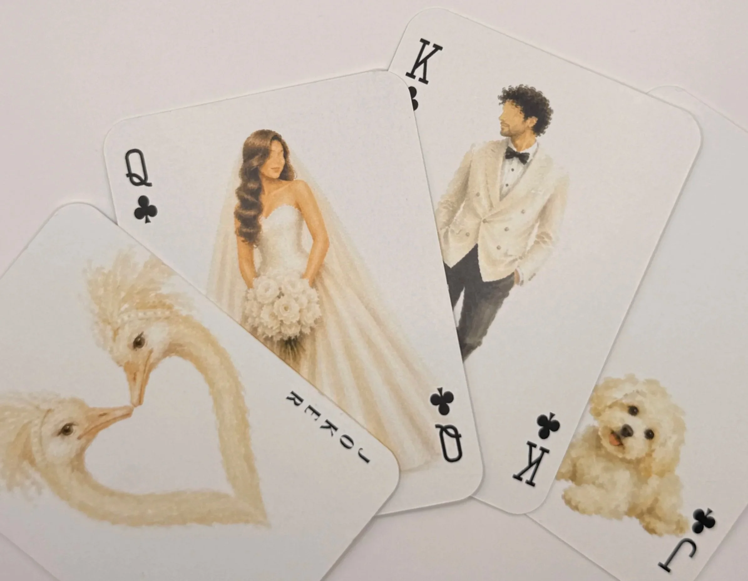 A playing card featuring a female jester with a multicolored hat and a smiling face, with the word "JOKER" vertically along the side.