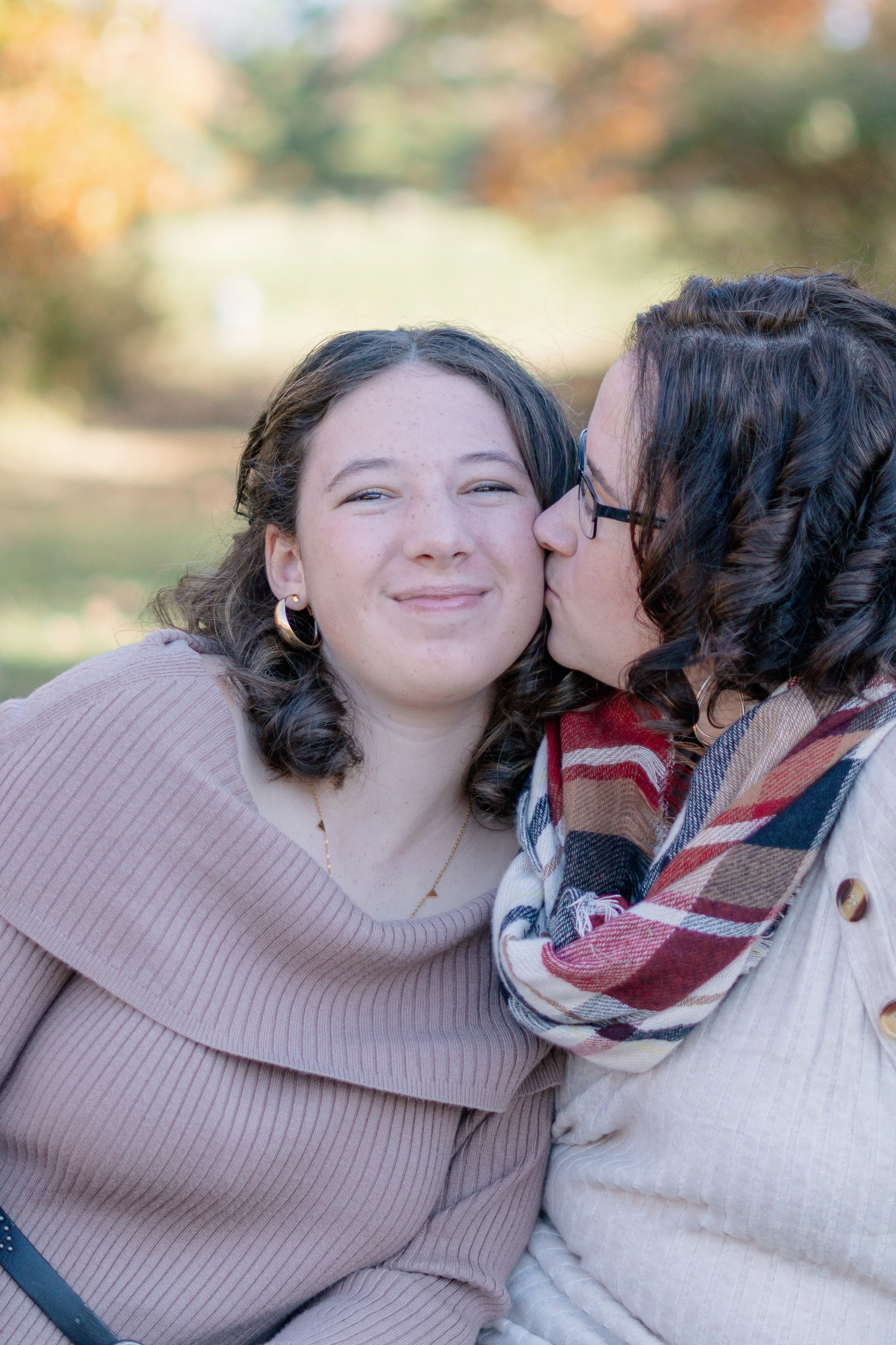 A mother and daughter enjoying an autumn family session at Peace Valley Park in Bucks County. 