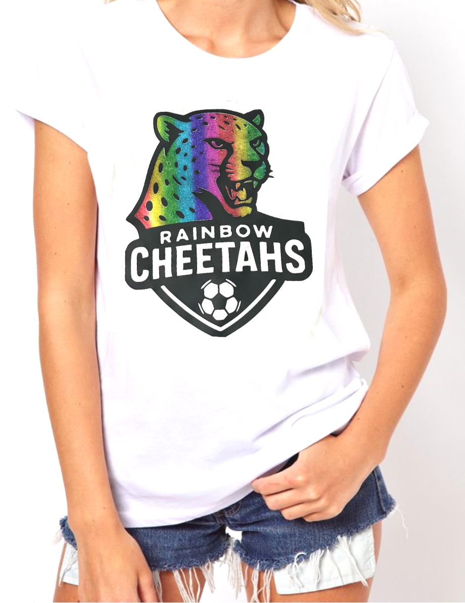 White T-shirt with a colorful rainbow cheetah logo and the words "Rainbow Cheetahs" underneath, and a soccer ball below the text.