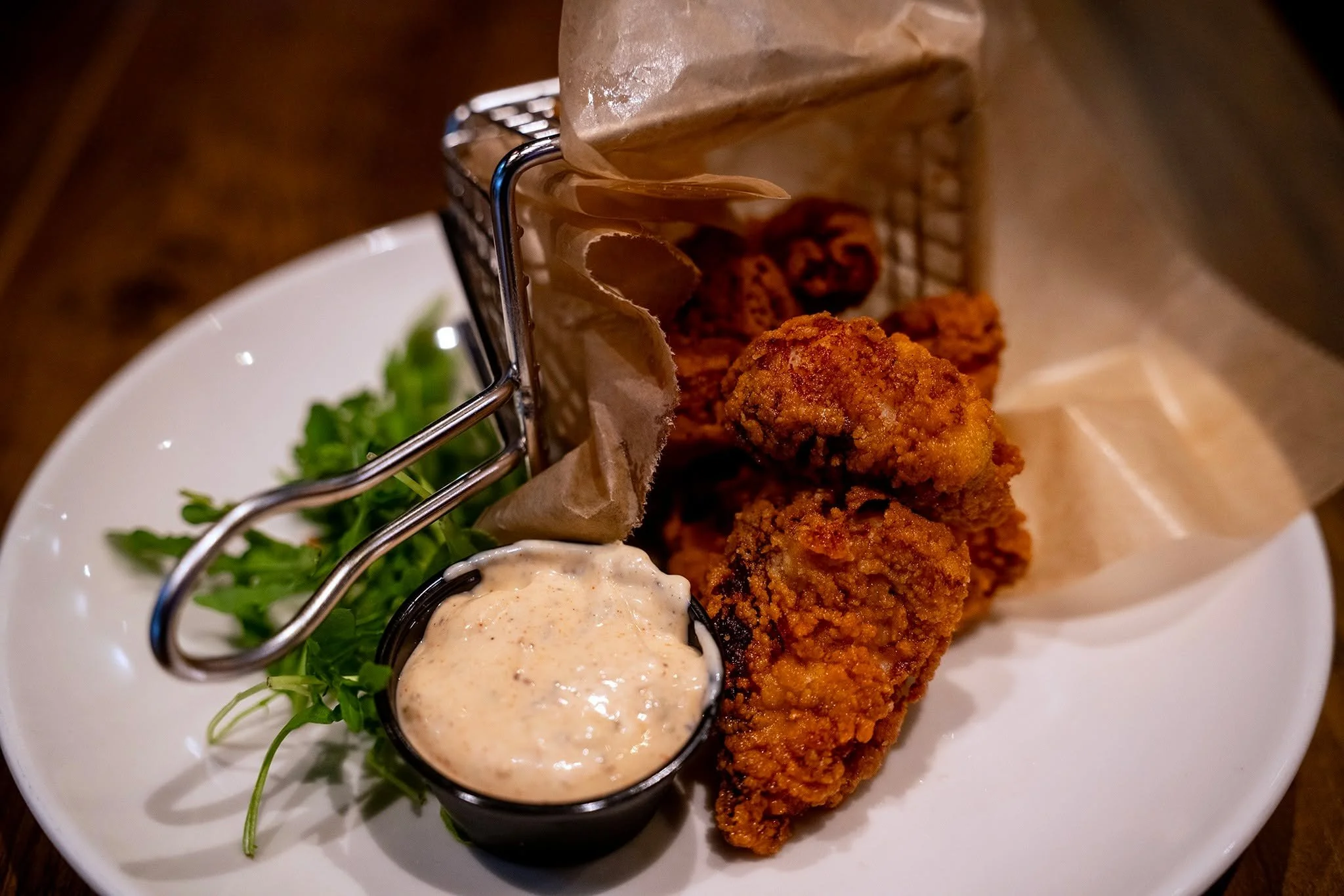SOUTHERN FRIED CATFISH BITES with Creole aioli. A perfect starter. 
Your question isn't "Am I ordering them?" You are. YES. The only question left is, "What's next?"