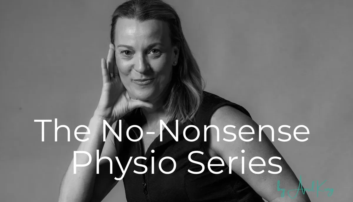 Black and white photo of a woman with shoulder-length hair, smiling, resting her head on her left hand with her elbow on her knee, wearing a sleeveless top.