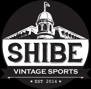 Logo of Shibe Vintage Sports featuring a dome building and the text 'SHIBE VINTAGE SPORTS EST 2014'