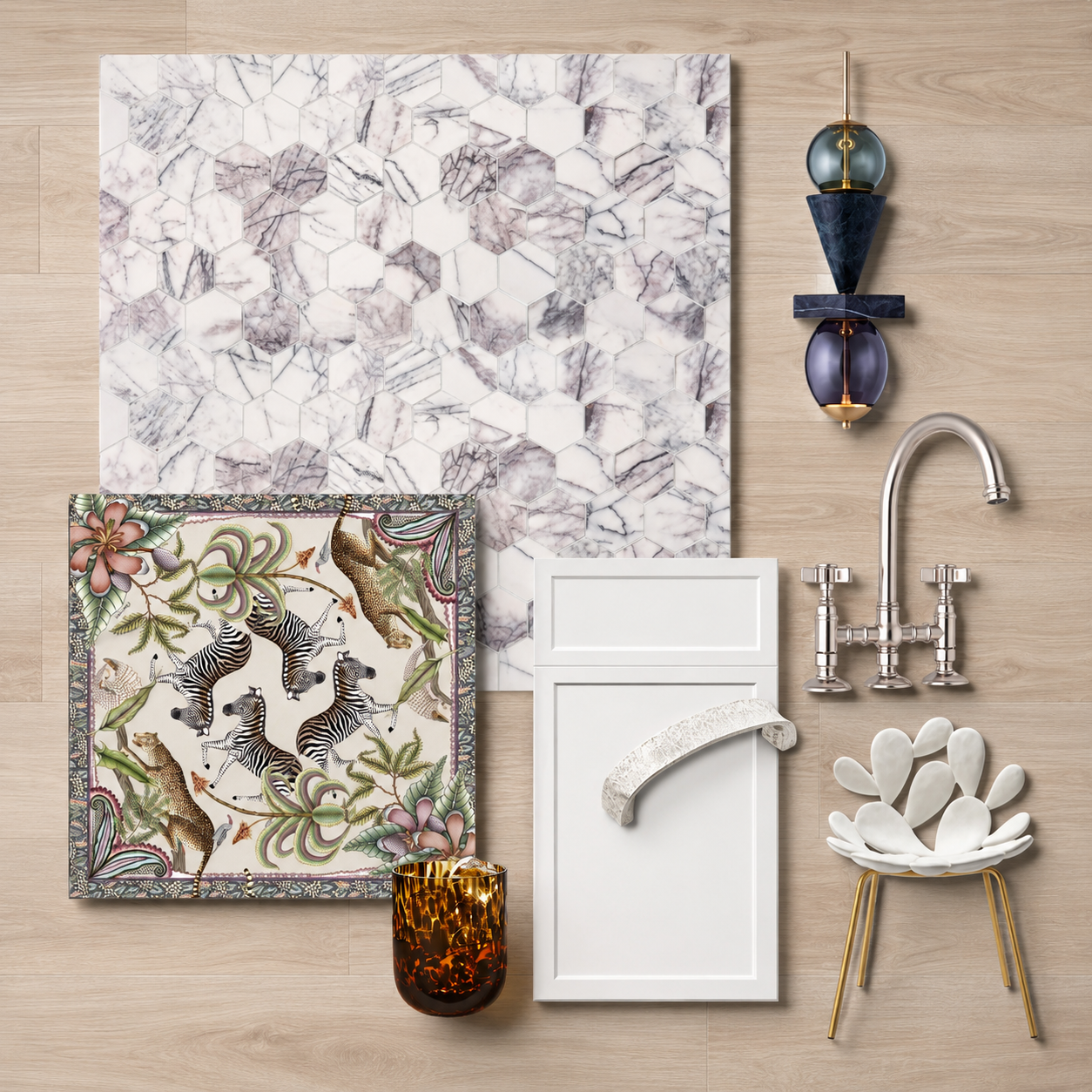 Material and decor palette for kitchen and dining room combining marble, brass, patterned fabrics, and decorative accessories in a luxury aesthetic.