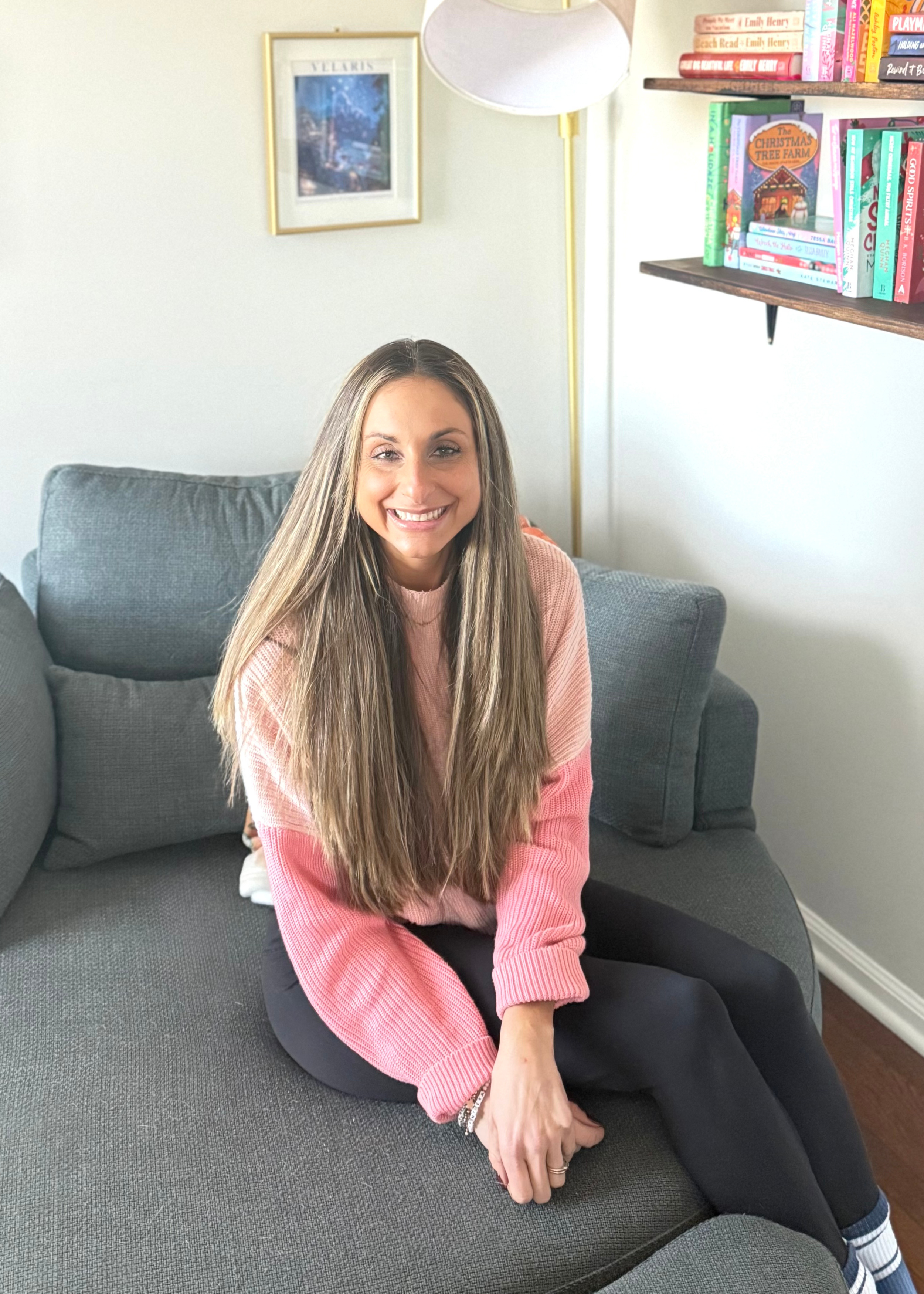 Marissa sitting in book nook