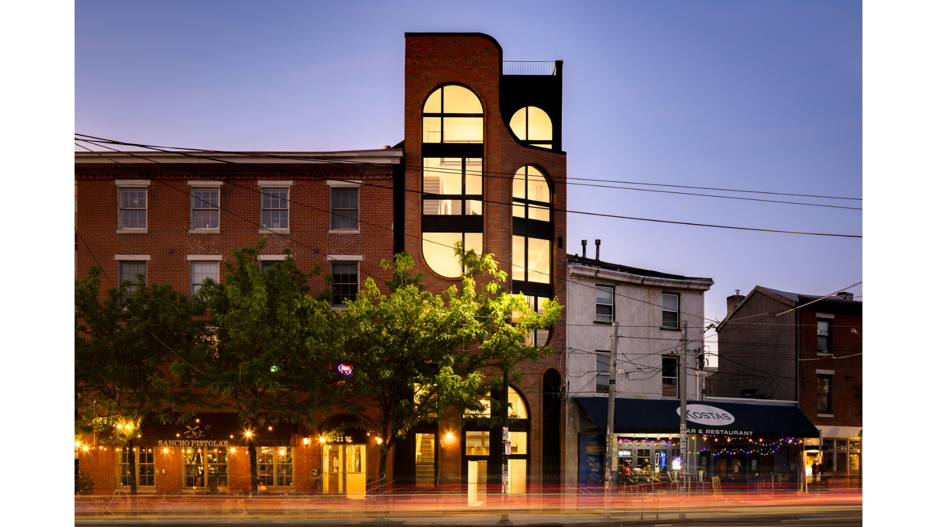 Structural engineering for a mixed-use building at 17 West Girard Avenue, featuring masonry construction, modern glass additions, and street-level retail in Philadelphia, PA.