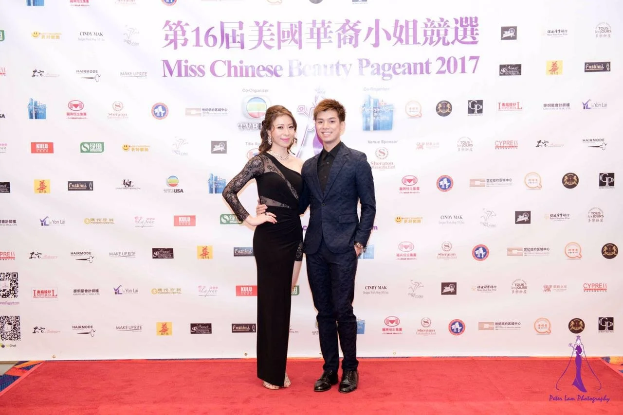 A man and woman posing on a red carpet at the 16th Miss Chinese Beauty Pageant 2017, with a white backdrop featuring logos and event information.