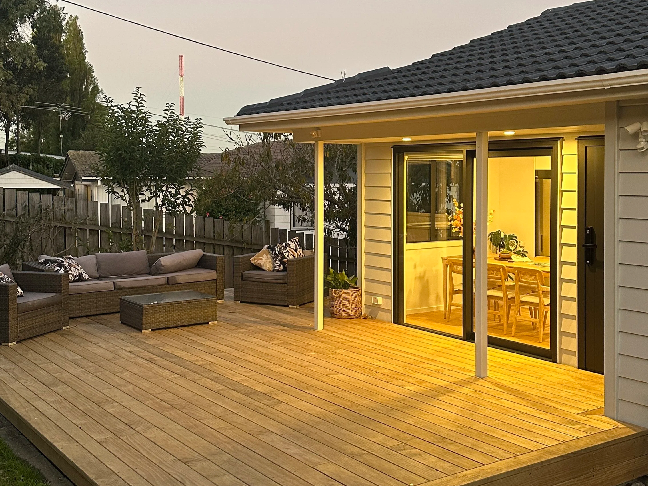Renovation of family home in Massey, Auckland by Greyson Builders with new timber cladding and joinery 