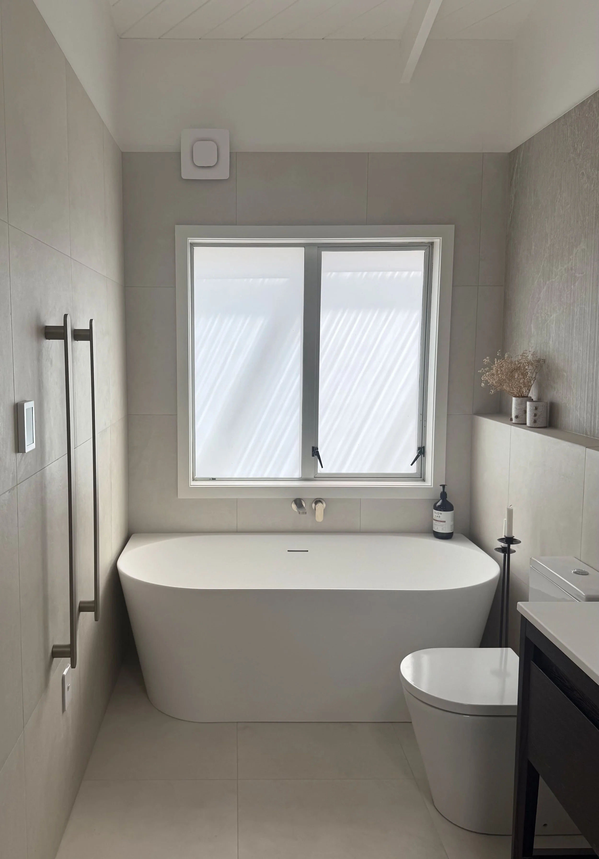Bathroom renovation for a family home in Whangaparāoa, Auckland by Greyson Builders
