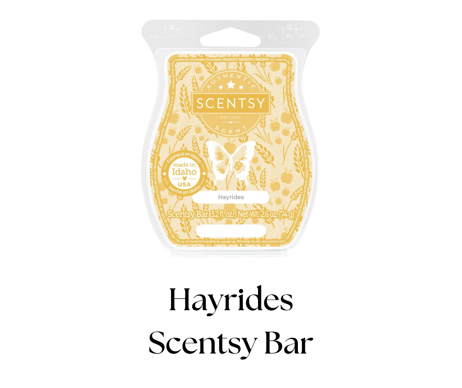 A Scentsy fragrance bar package in a cream and gold color, with a butterfly and floral design, labeled 'Hayrides'.