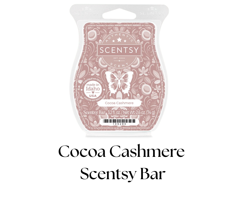 Scentsy Cocoa Cashmere scented wax bar in pink packaging with butterfly illustration and floral design, made in Idaho, USA, 32 ounces.