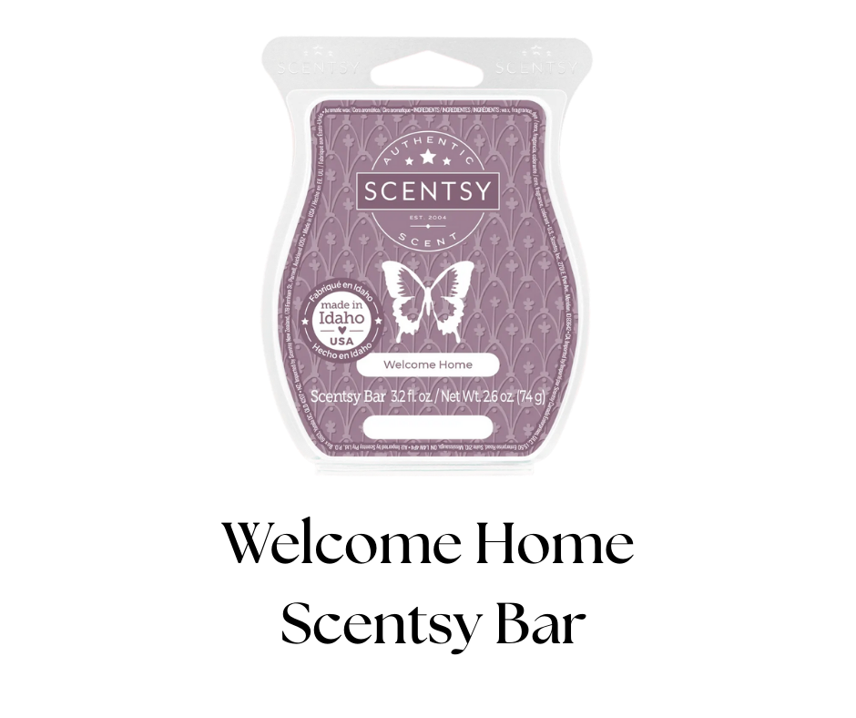 Scentsy bar in purple packaging featuring a butterfly and floral design, labeled 'Welcome Home', made in Idaho, USA, with net weight 2.6 ounces.