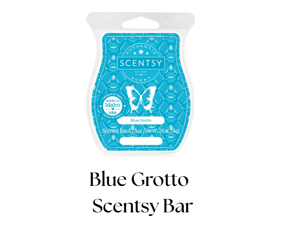 Scentsy scented wax bar package in blue, with butterfly and shell patterns, labeled 'Blue Grotto,' featuring a butterfly logo and text indicating it was made in Idaho, USA, and weighing 3.2 ounces.