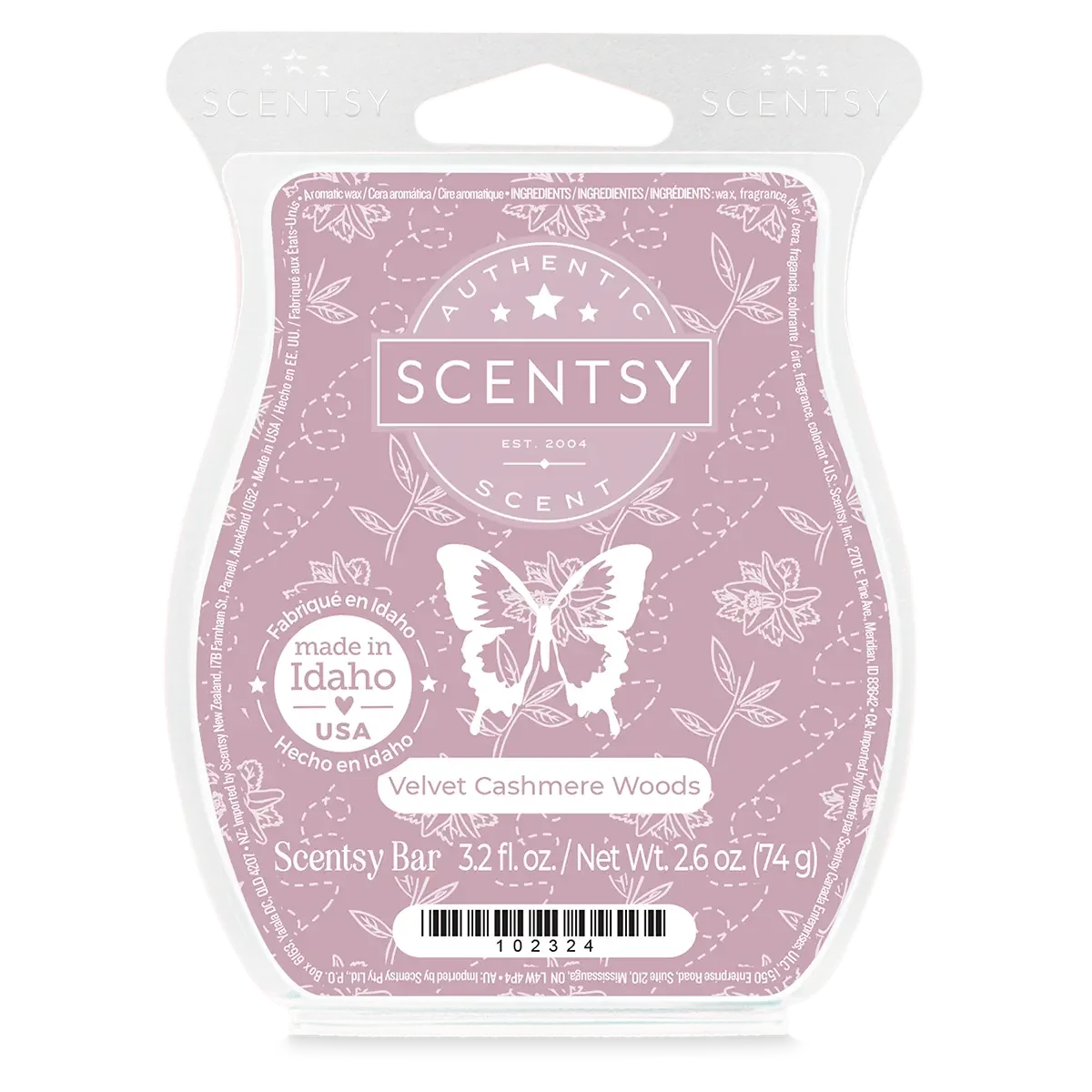 Scentsy bar labeled 'Velvet Cashmere Woods' in pastel purple packaging with a butterfly and floral design, indicating it is made in Idaho, USA, with 3.2 fluid ounces.
