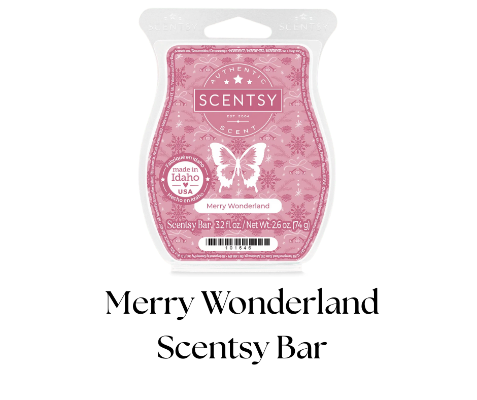 A pink Scentsy scent bar package labeled 'Merry Wonderland,' featuring a butterfly logo and snowflake patterns, indicating it is made in Idaho, USA, with a net weight of 2.6 ounces.