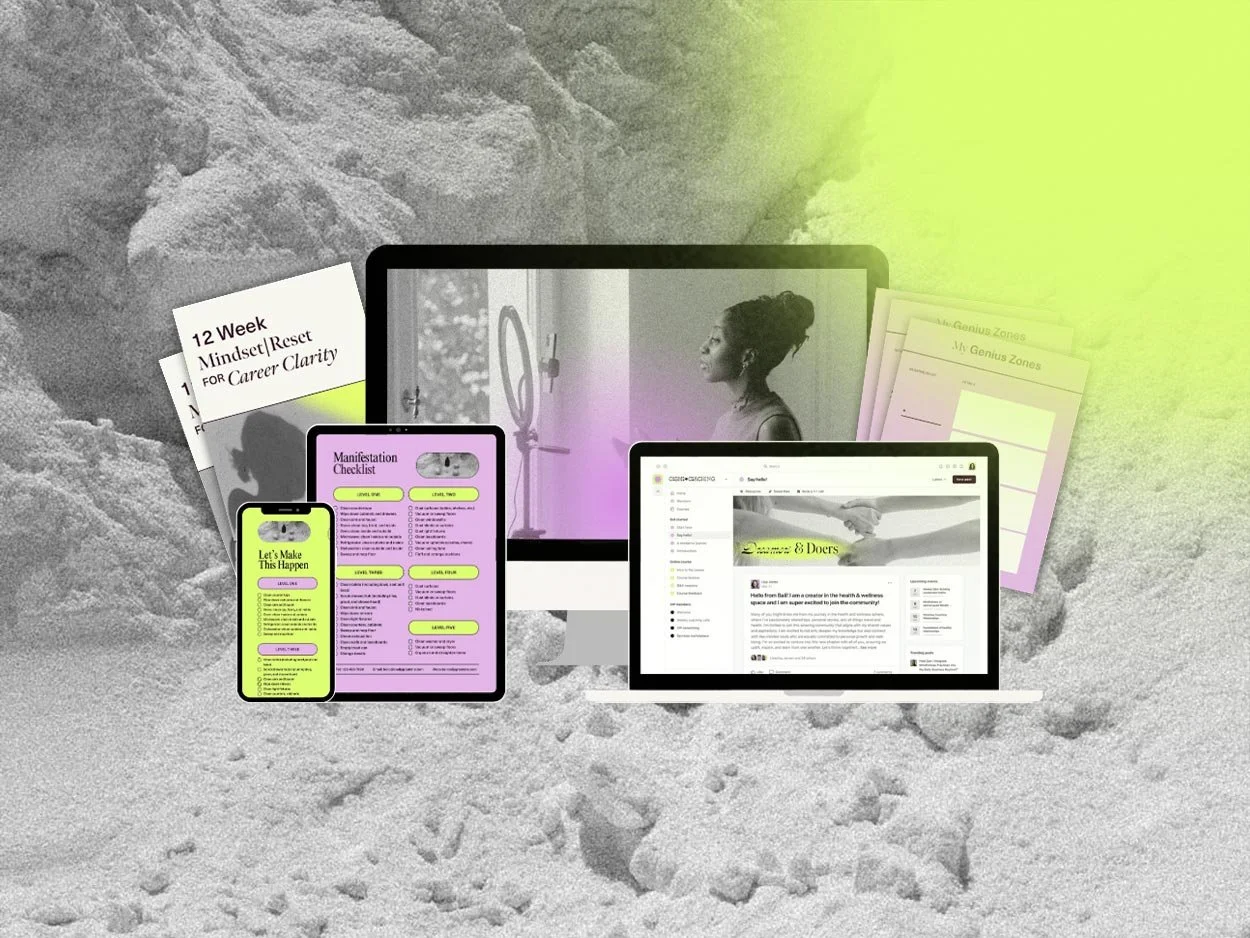 Digital devices including a computer monitor, laptop, tablet, and smartphone on sandy ground against a background of a woman looking into a mirror, with printed materials and worksheets surrounding them.