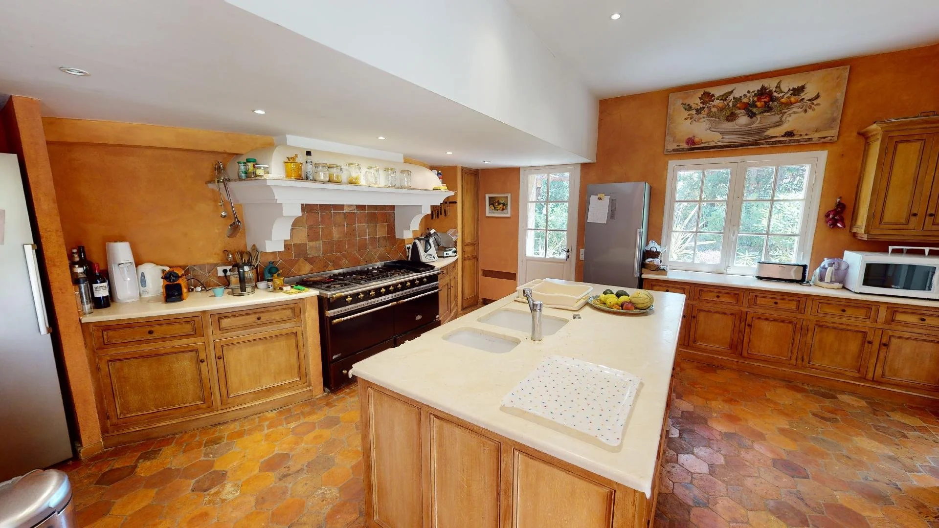 Spacious family kitchen at luxury villa rental in Les Parcs de Saint-Tropez.