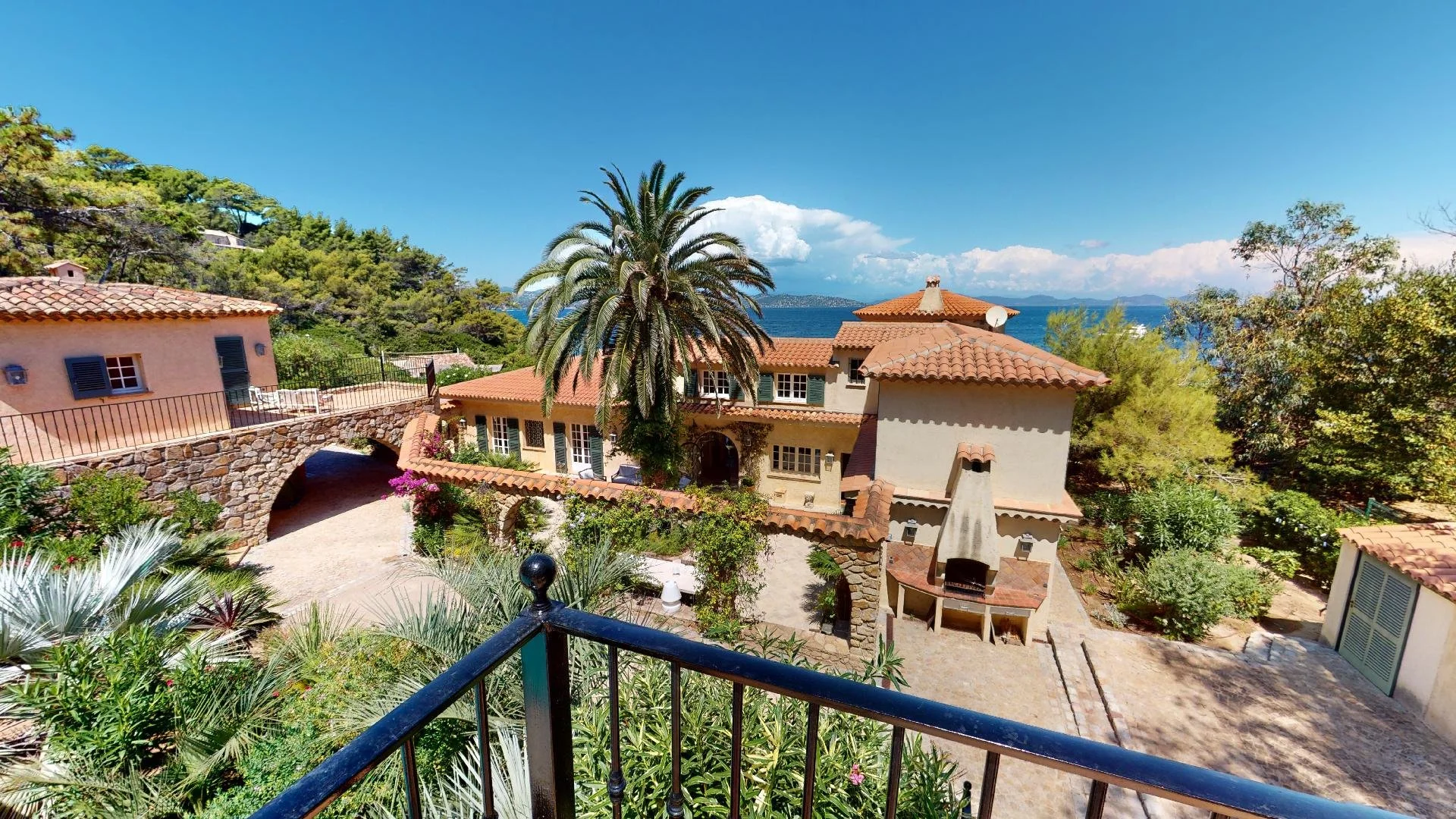 Sea view from balcony of waterfront villa in Les Parcs de Saint-Tropez.