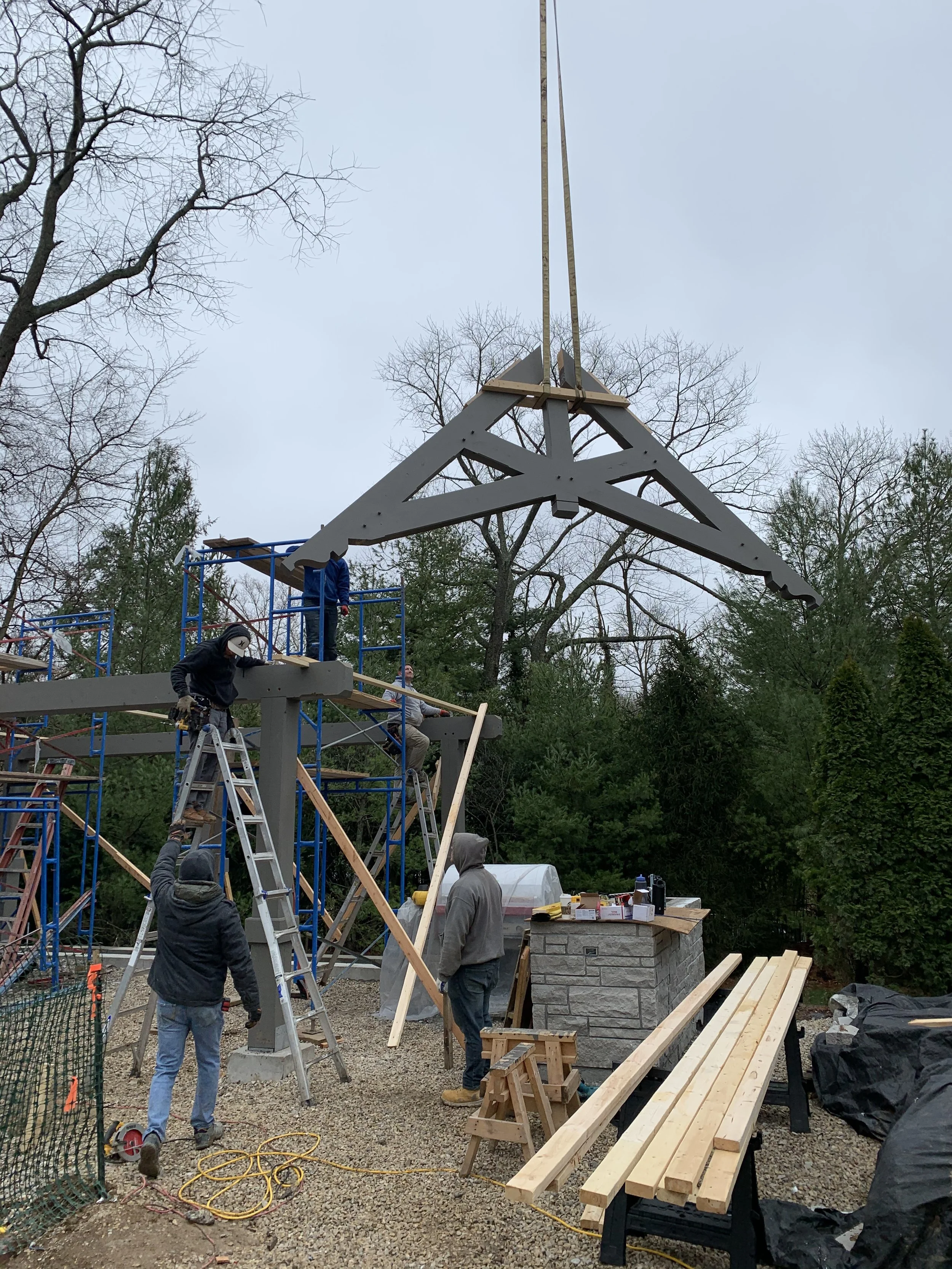 Perfectly crafted scissor truss being craned into position