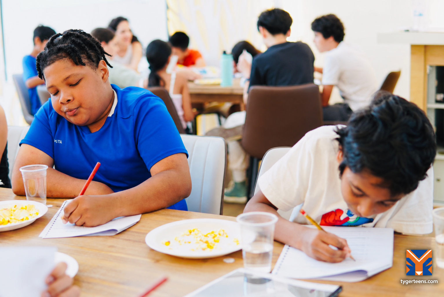 Young people practise reflection and focused learning during a Tyger Teens character-development activity in Singapore.