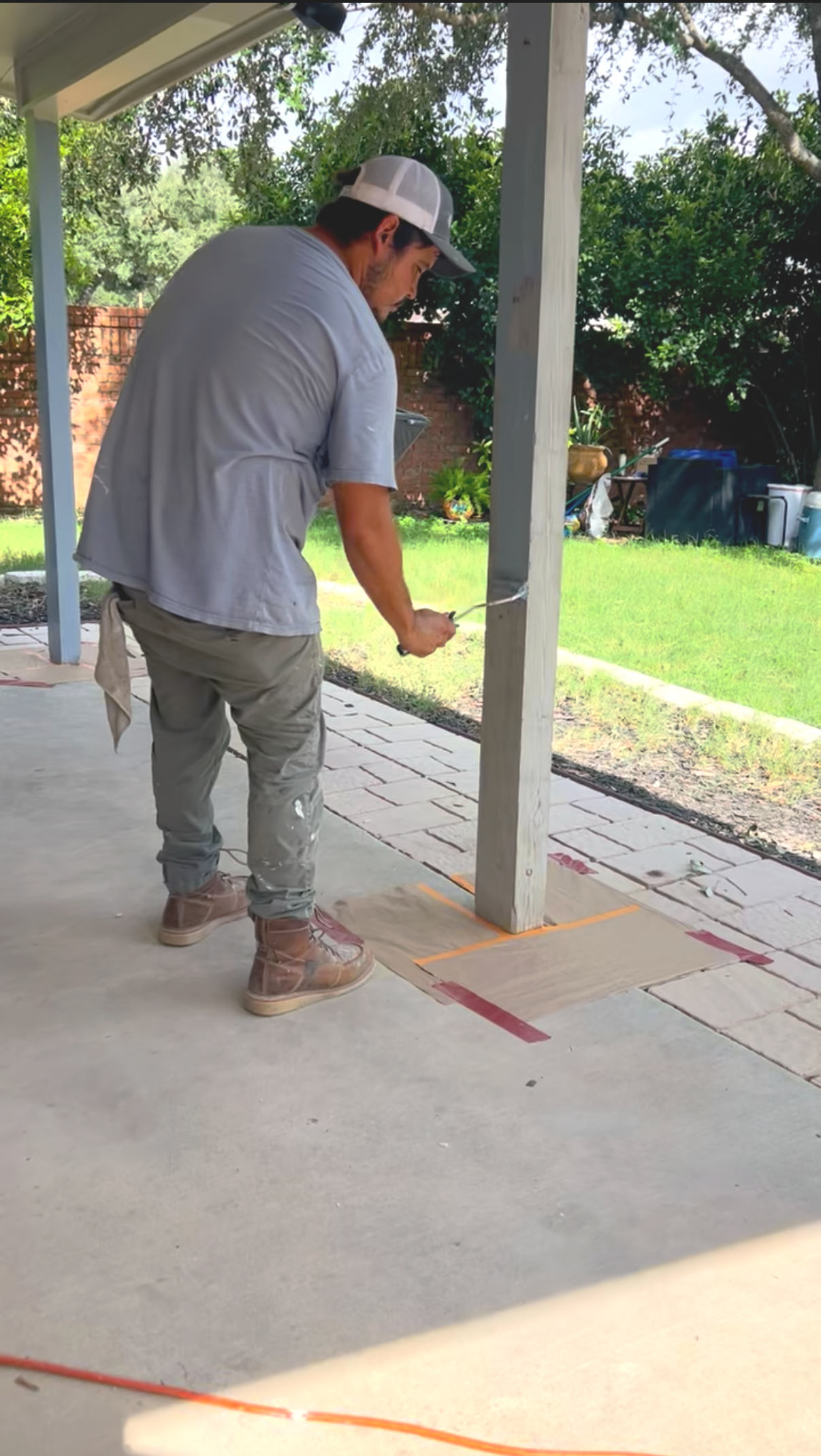 Brush Paint Pros painting an exterior patio column in San Antonio