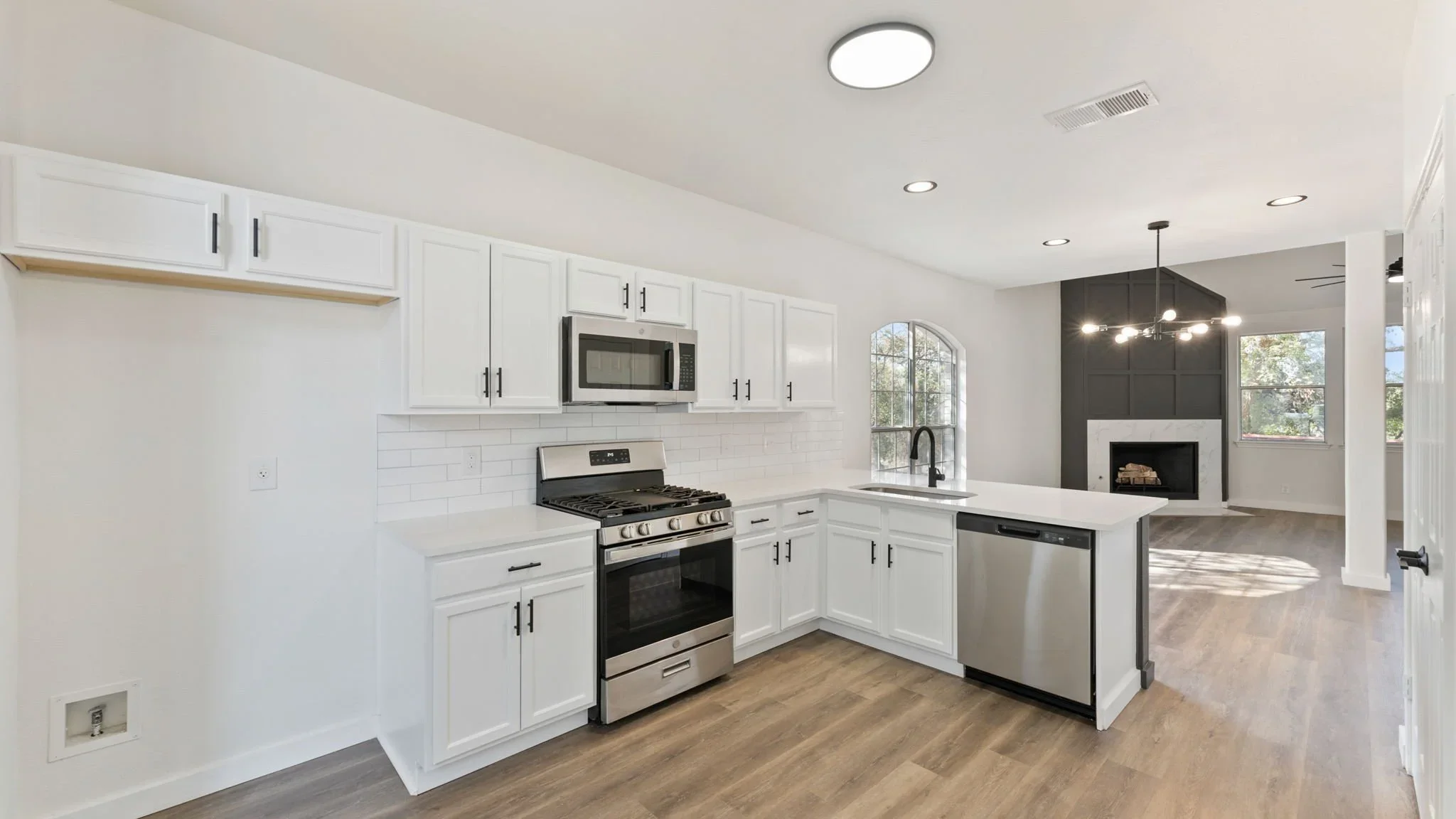 Professionally painted white kitchen cabinets in San Antonio