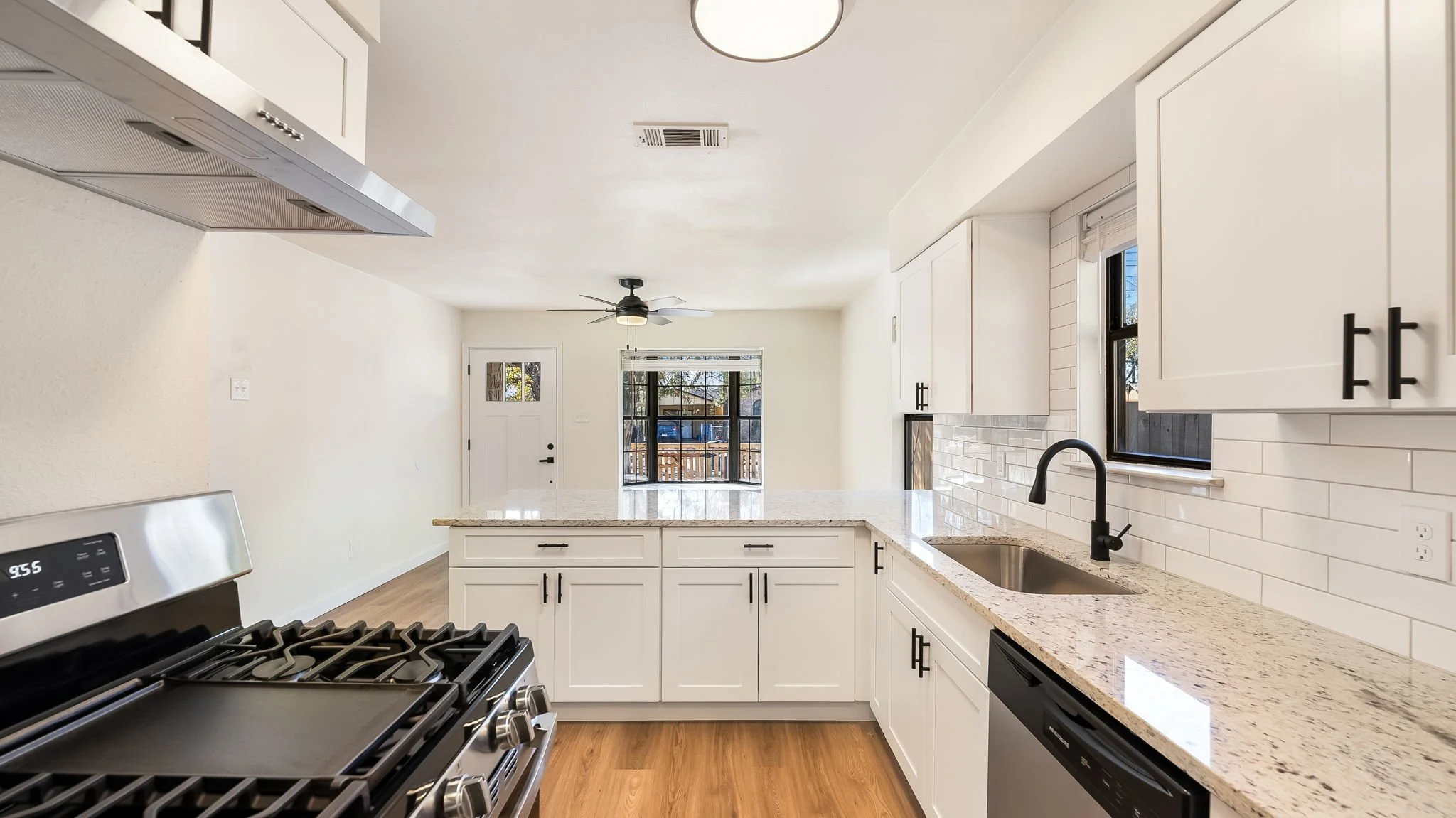 Professionally painted white kitchen cabinets in San Antonio