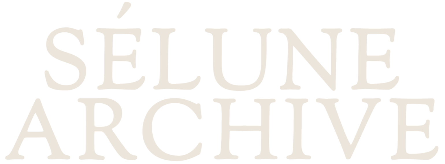 Text reading 'SÉLUNE ARCHIVE' in large, beige letters on a black background.