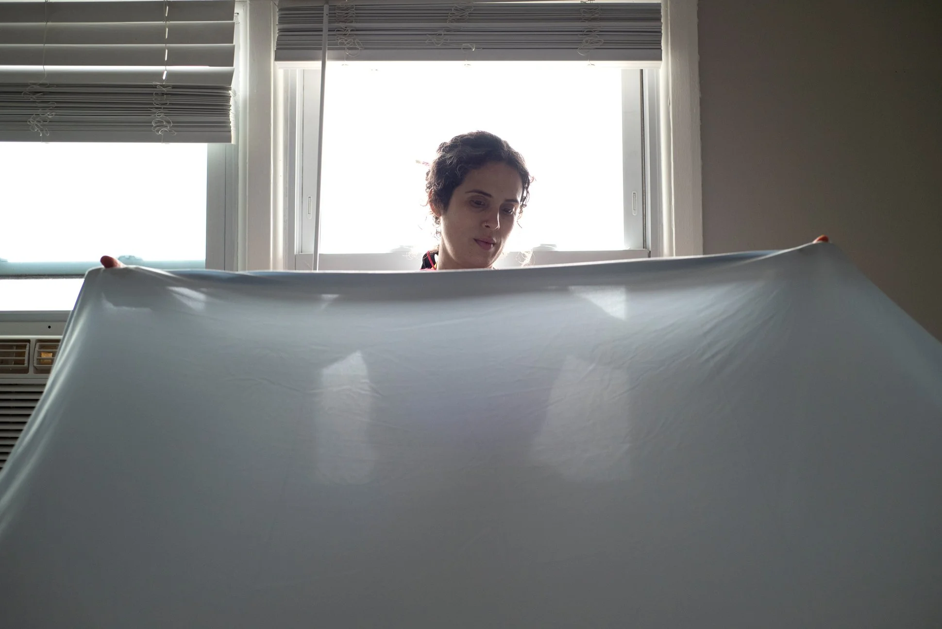 Long Branch, New Jersey, 2025. Camila Oliveira, (a pseudonym), is a young woman of Brazilian origins. She has been living in New Jersey for a few months, but has been in the United States for two years. In Brazil, she graduated as a civil engineer, b