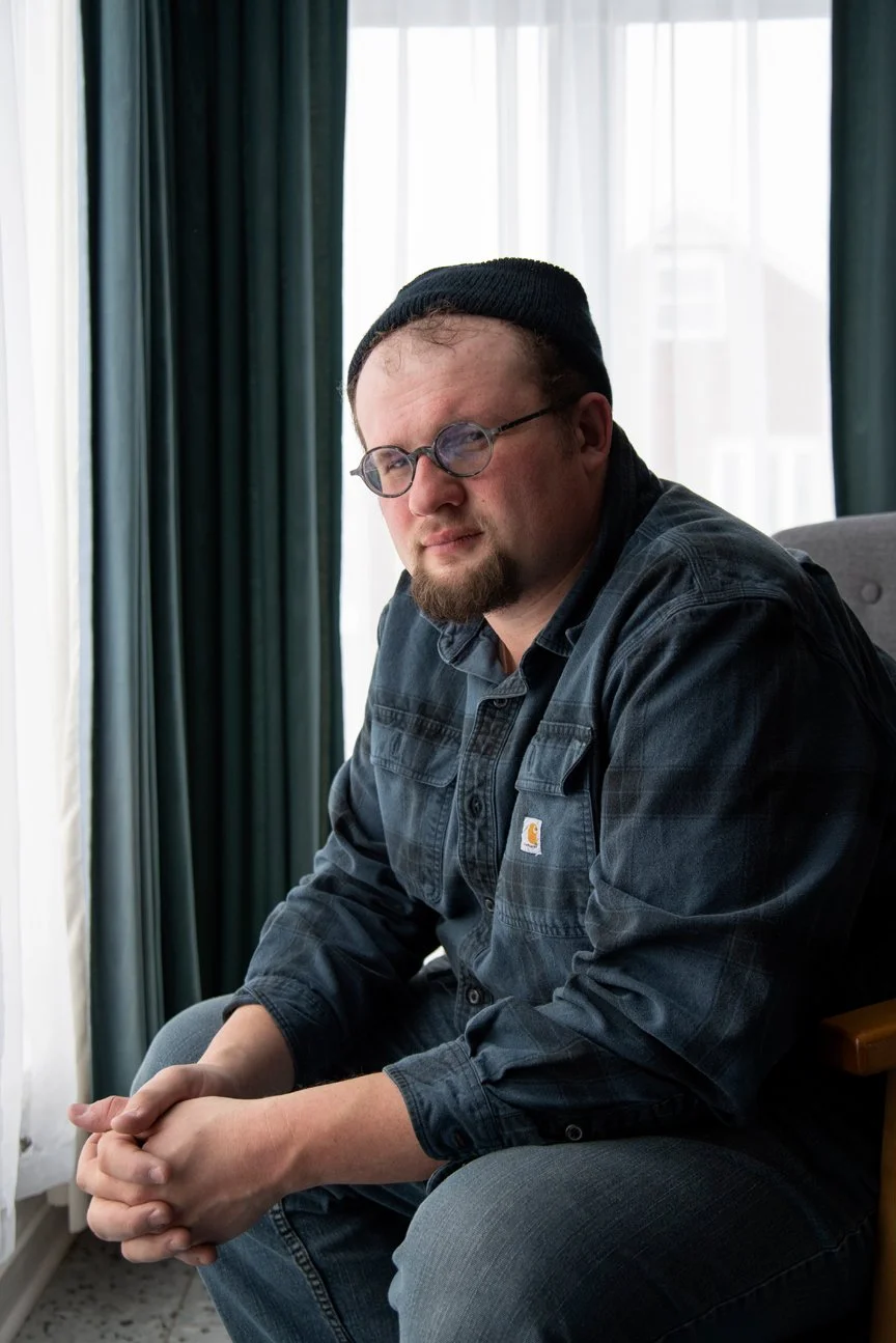 West Mifflin, Pennsylvania, 2025. Ron Bohin, in his home, has fulfilled his lifelong dream of working with trains after many years at the USS steel mill. He works for Amtrak, taking care of track safety, and also for the Port Authority of Allegheny C