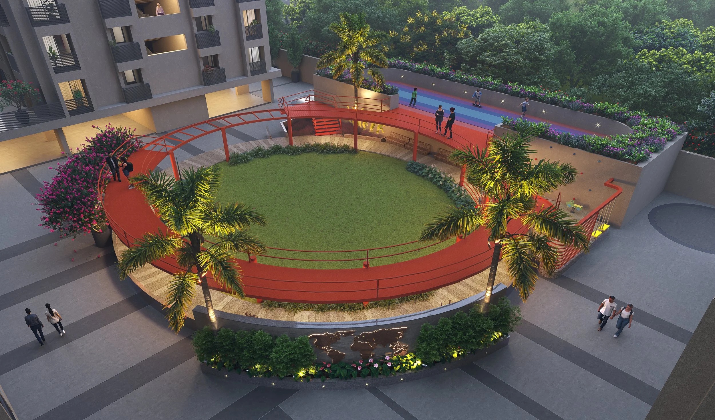An aerial view of a modern residential complex courtyard with a central grassy area encircled by a red walkway, surrounded by palm trees, colorful plants, and a decorative world map wall. There's a multi-story building on one side, and a long, elevat