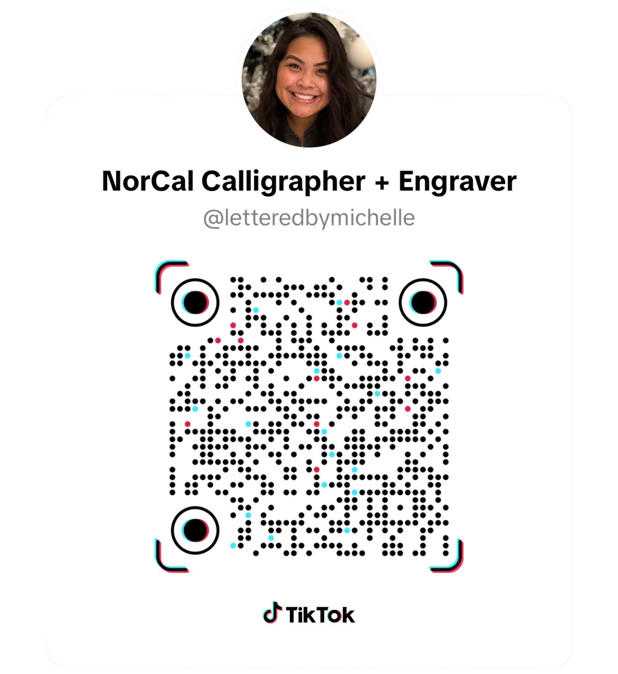 Profile of a woman with dark hair smiling, with a role name 'NorCal Calligrapher + Engraver' and TikTok username '@letteredbymichelle'. Contains a QR code with colorful accents, TikTok logo at the bottom.