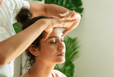 Indian head massage being performed as part of a relaxing holistic therapy session in Cumbria