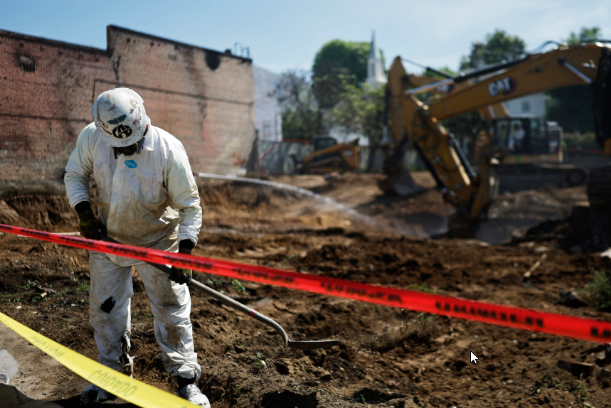 Houses left standing by fires still hazardous