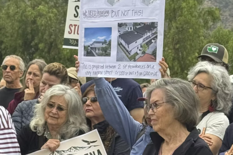 Eaton Fire survivors rally for bill stopping land grab by developers