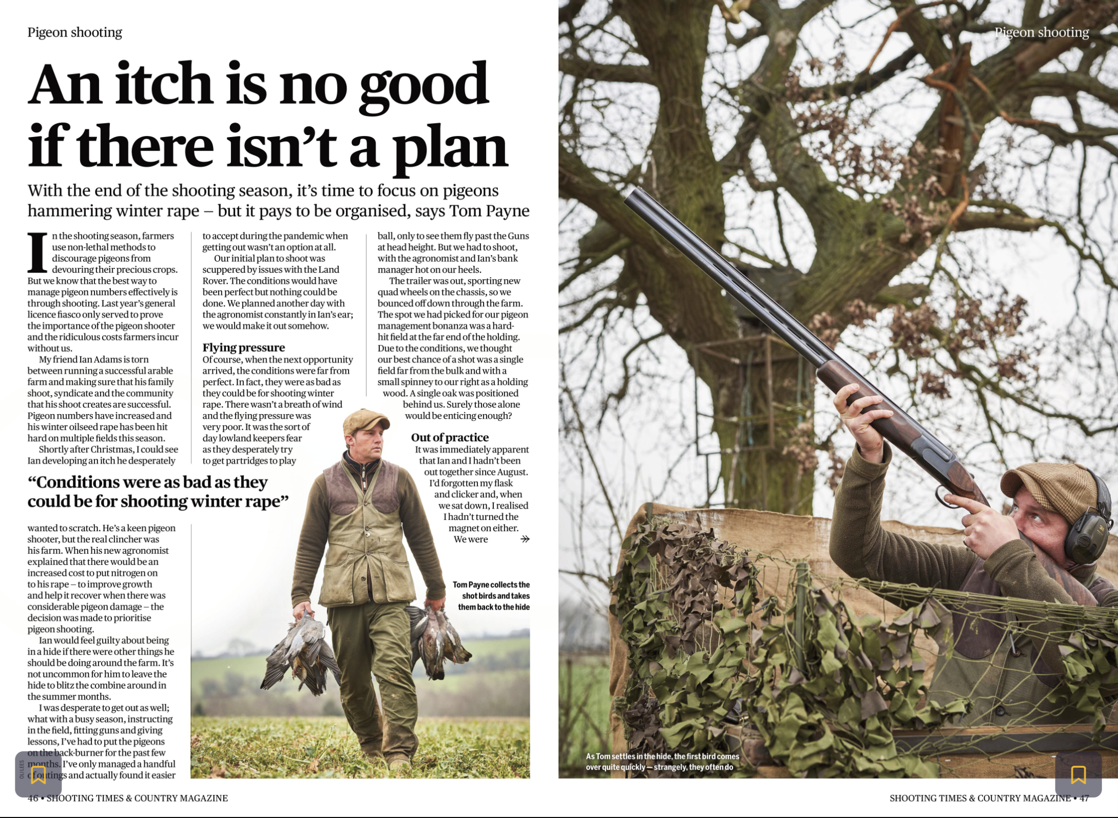 A man in a brown cap and green jacket aiming a shotgun from a hide with binoculars and camouflage netting, set outdoors with trees in the background.