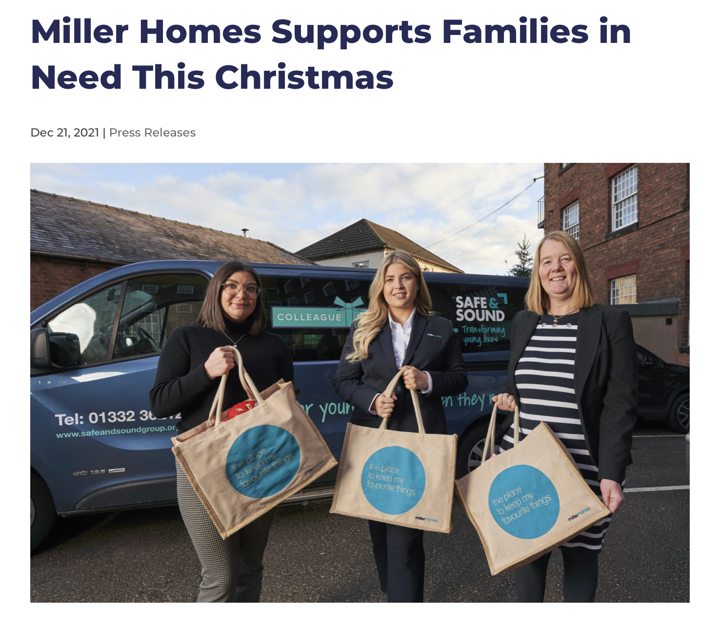 Three women standing outdoors in front of a Safe & Sound van, holding beige tote bags with blue circles and text, promoting support for families during Christmas.