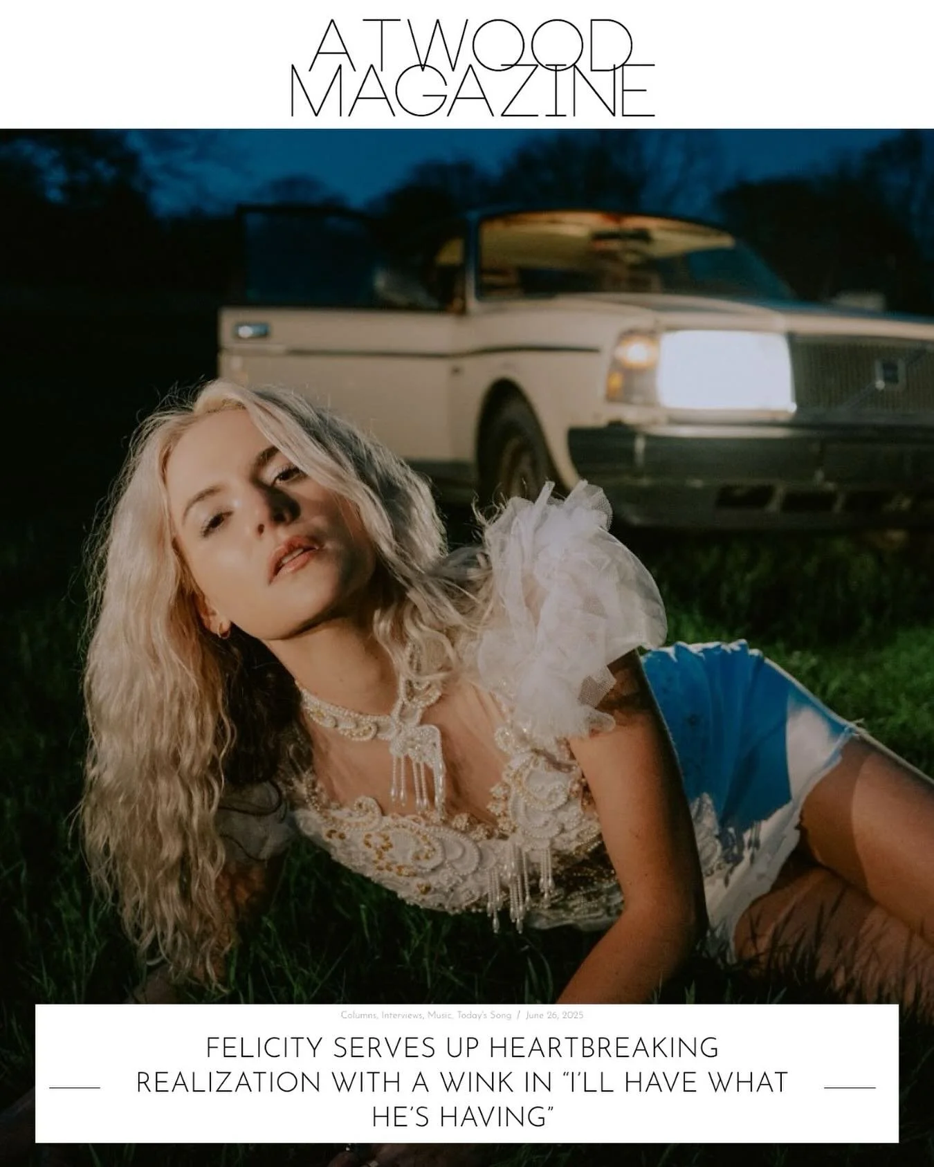Magazine cover featuring a woman lying on the grass in front of a vintage car at dusk with the headline about heartbreak and realization.
