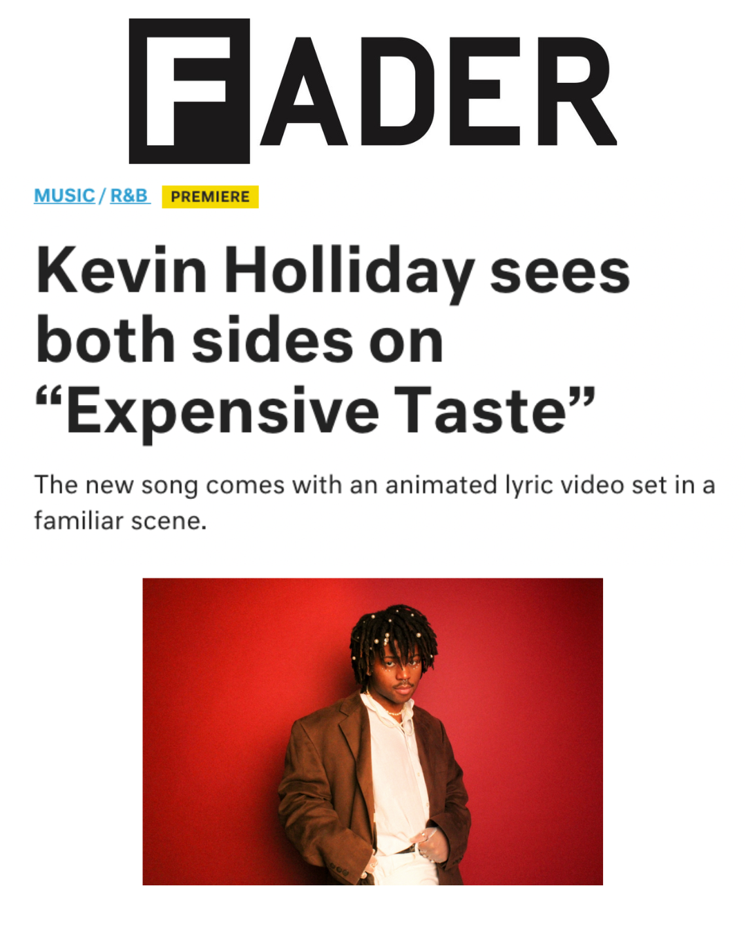 A magazine page with the headline about Kevin Holliday, featuring a photo of a man with dreadlocks, standing against a red backdrop, wearing a brown blazer and white shirt.