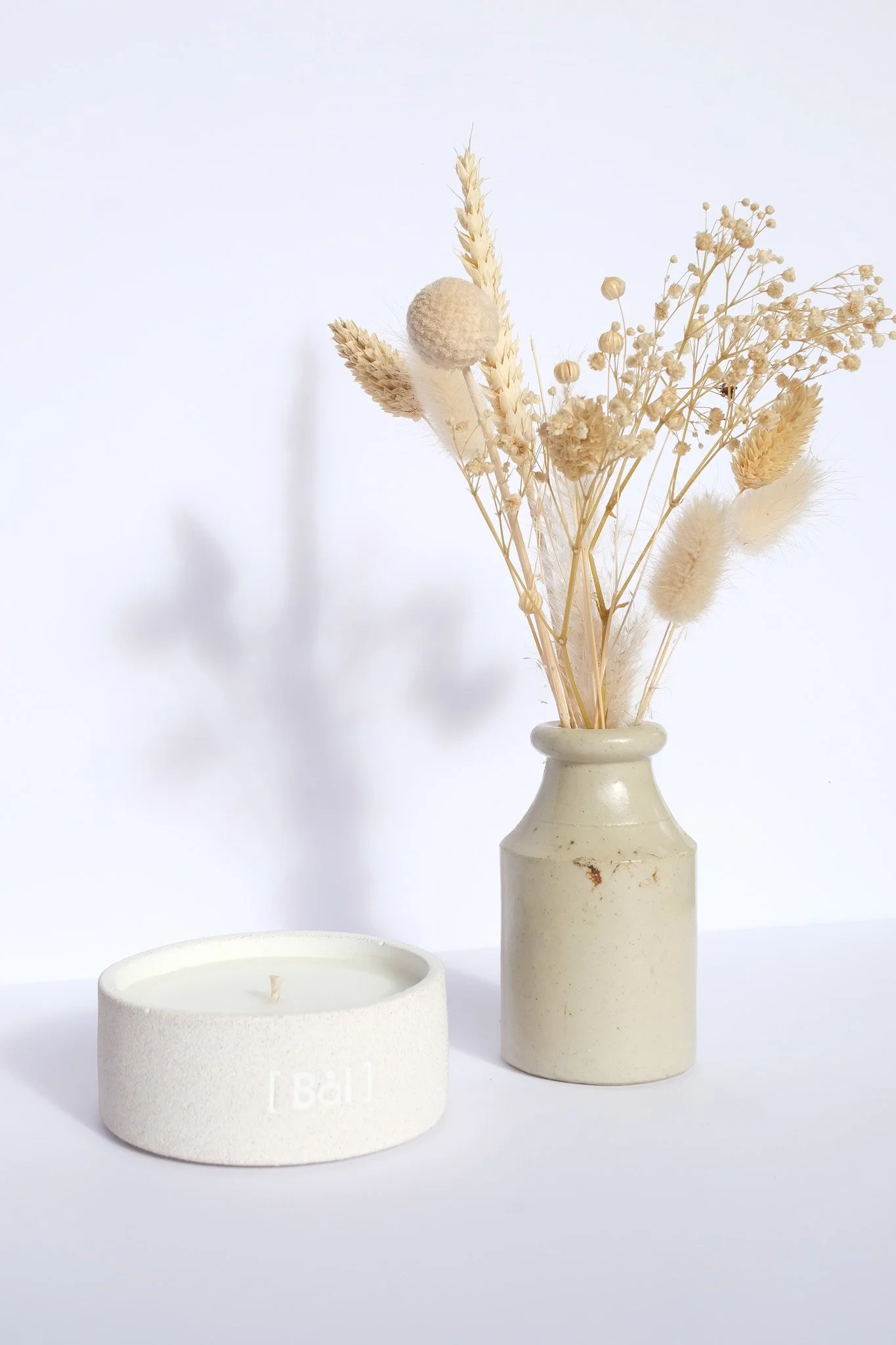 Vue dessus bougie cire végétale mèche coton pot granit