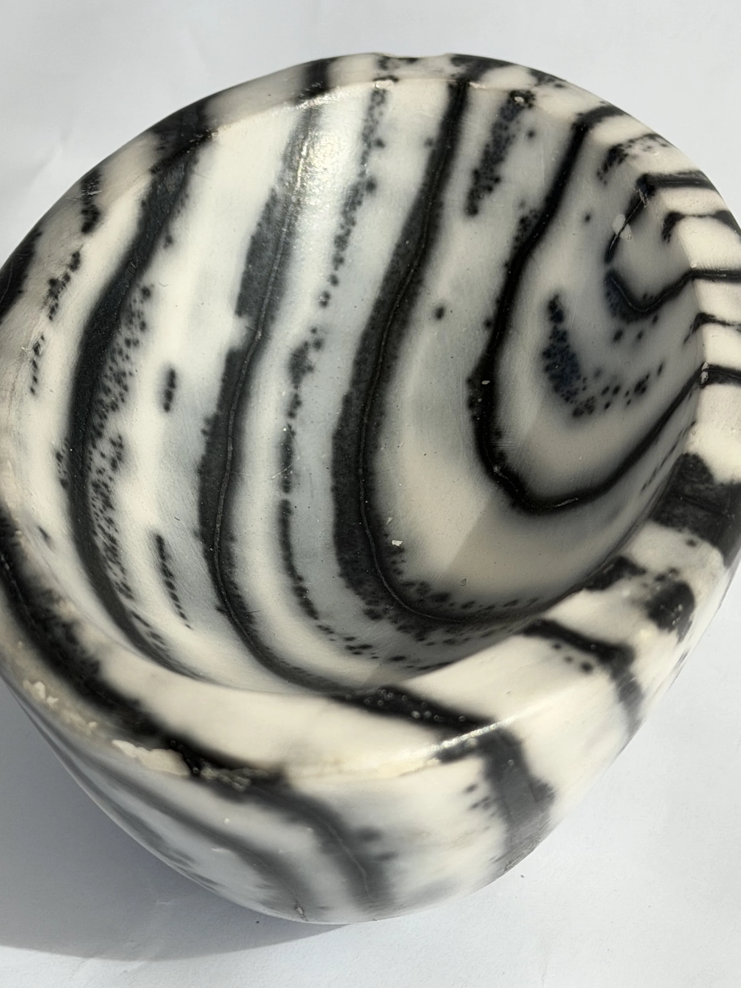 detail of small naked raku ceramic bowl