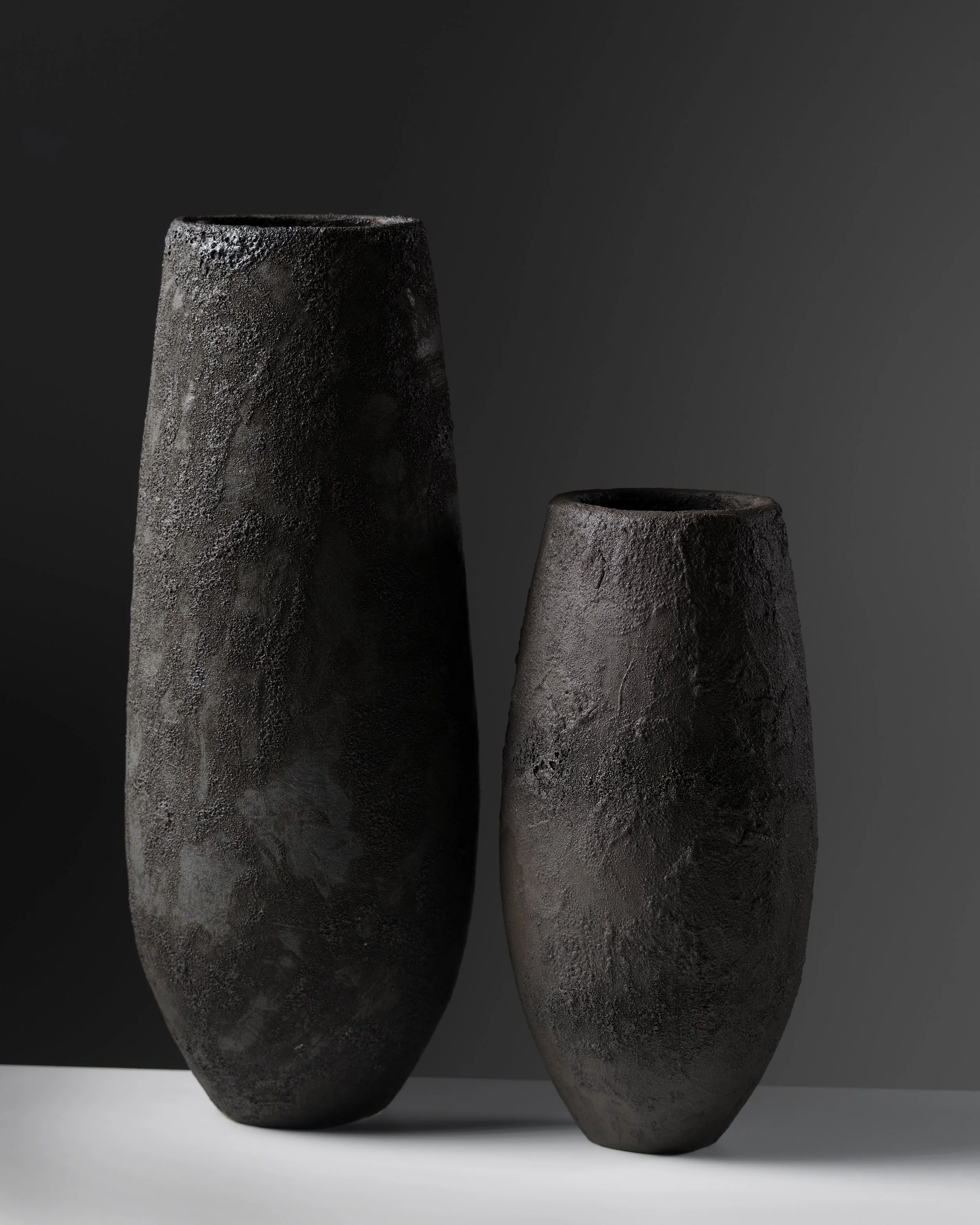 2 tall lava vases.jpg