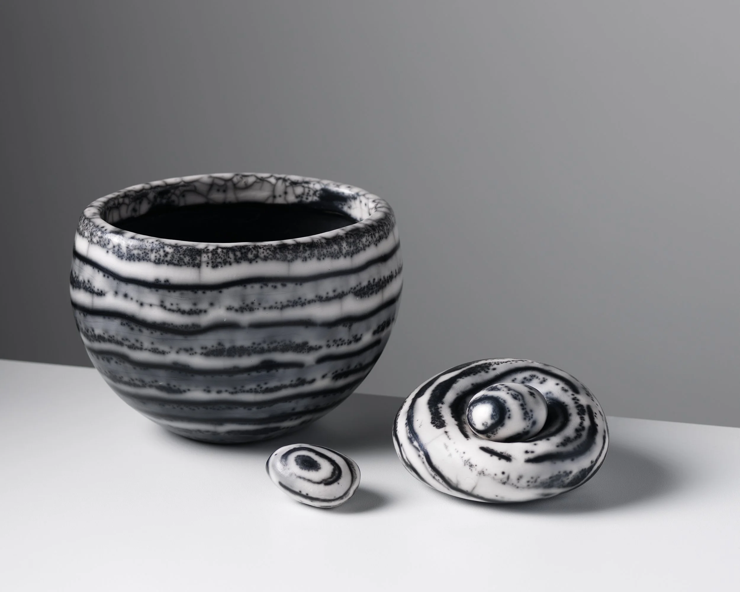 strata vessel and small sitting stone.jpg