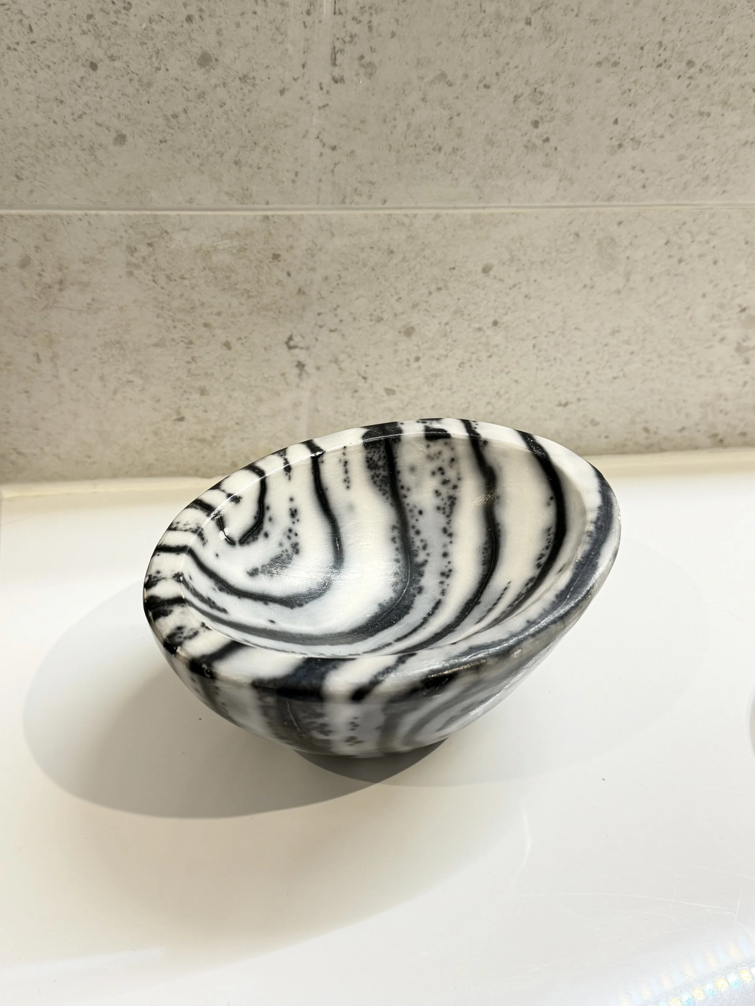 Black and white naked raku small ceramic bowl. Unique one of a kind inspired by nature made by naked raku specialist Moyra Stewart