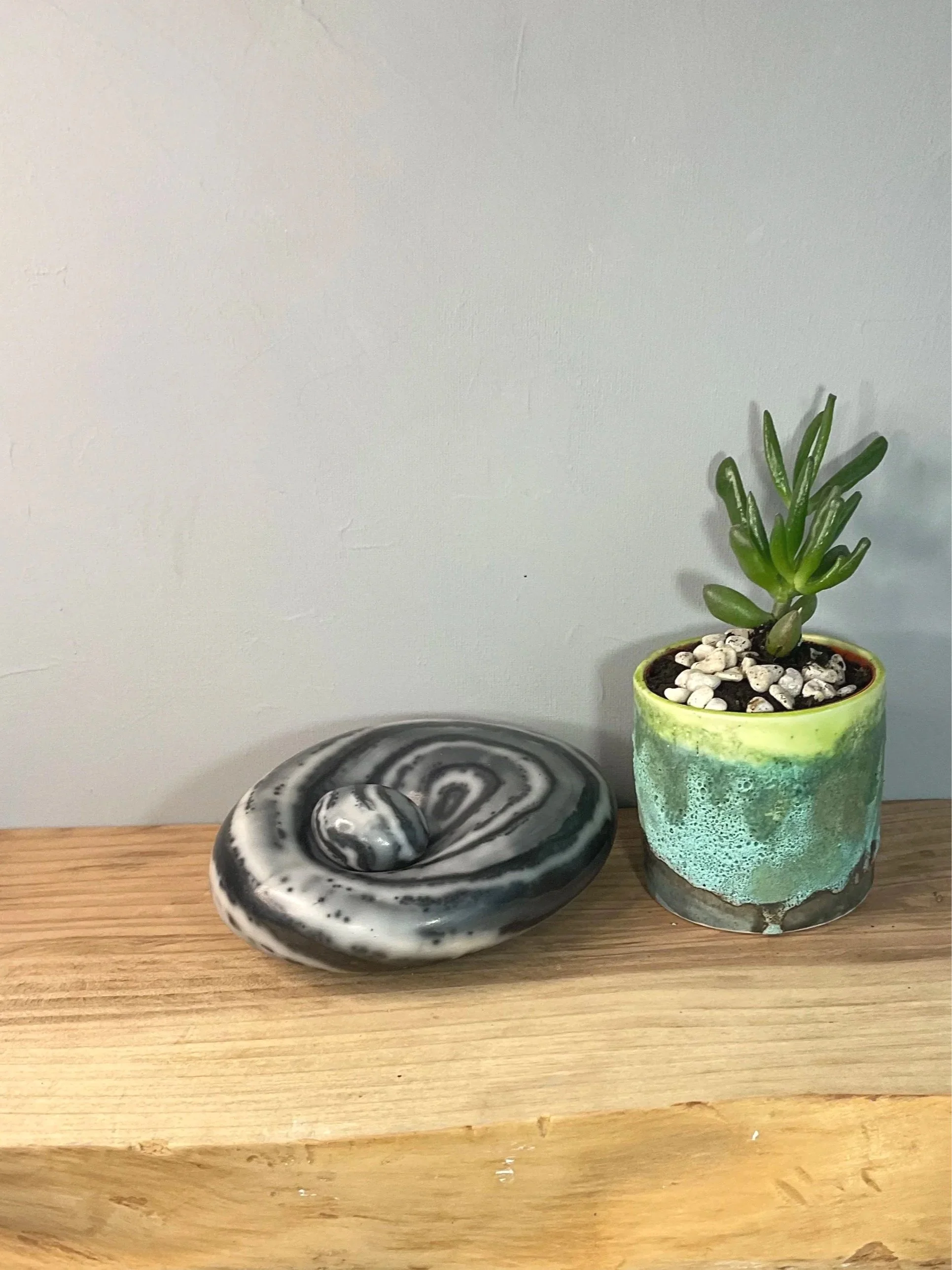 Naked Raku Sitting Stone black and white pebble with small pebble nestled within