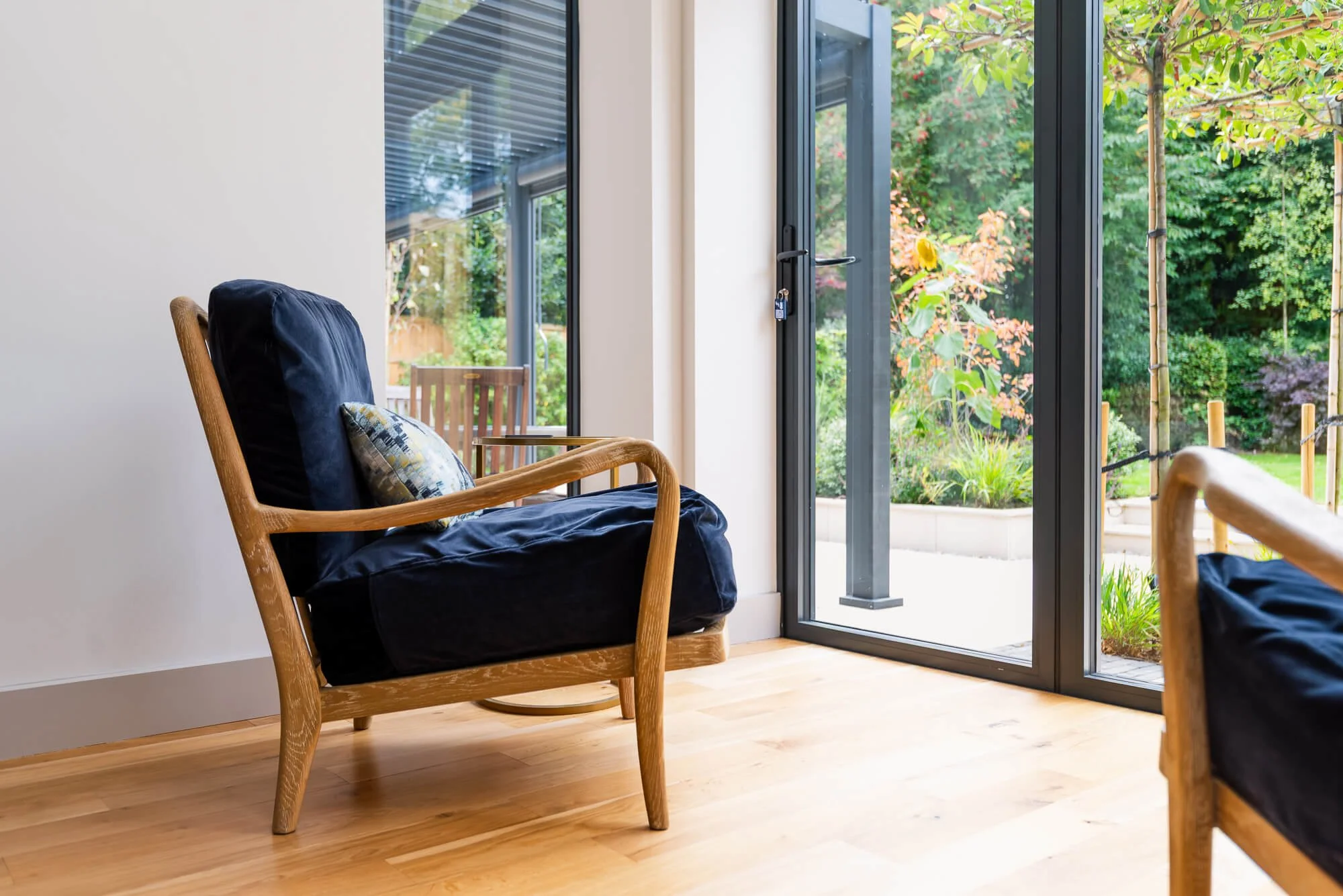 howson-design-interiors-edwalton-house-extension-blue-chair.jpg