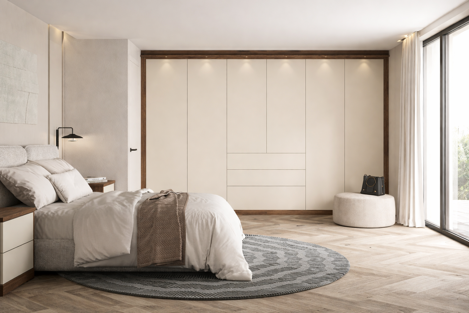 Modern bedroom with a bed, nightstands, a large built-in closet, a circular ottoman with a camera on top, and large sliding glass doors with curtains.