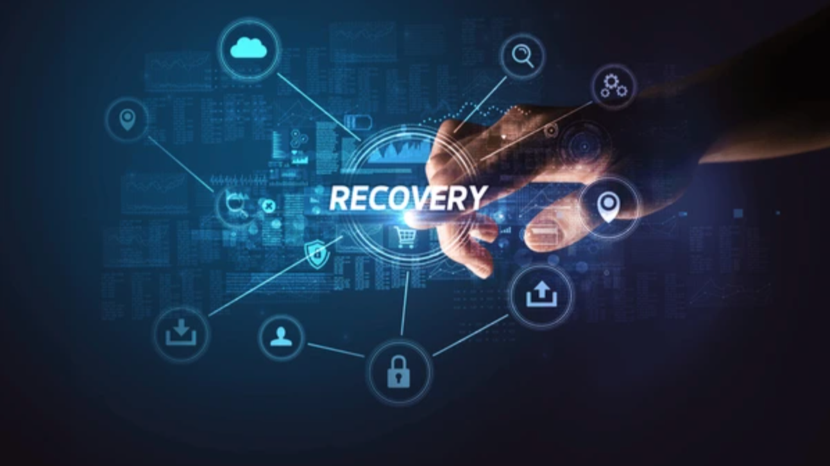 Digital graphic of a hand pointing to the word 'RECOVERY' surrounded by icons representing cloud storage, location, shopping cart, download, user profile, lock, and upload, with a dark blue background of data and charts.